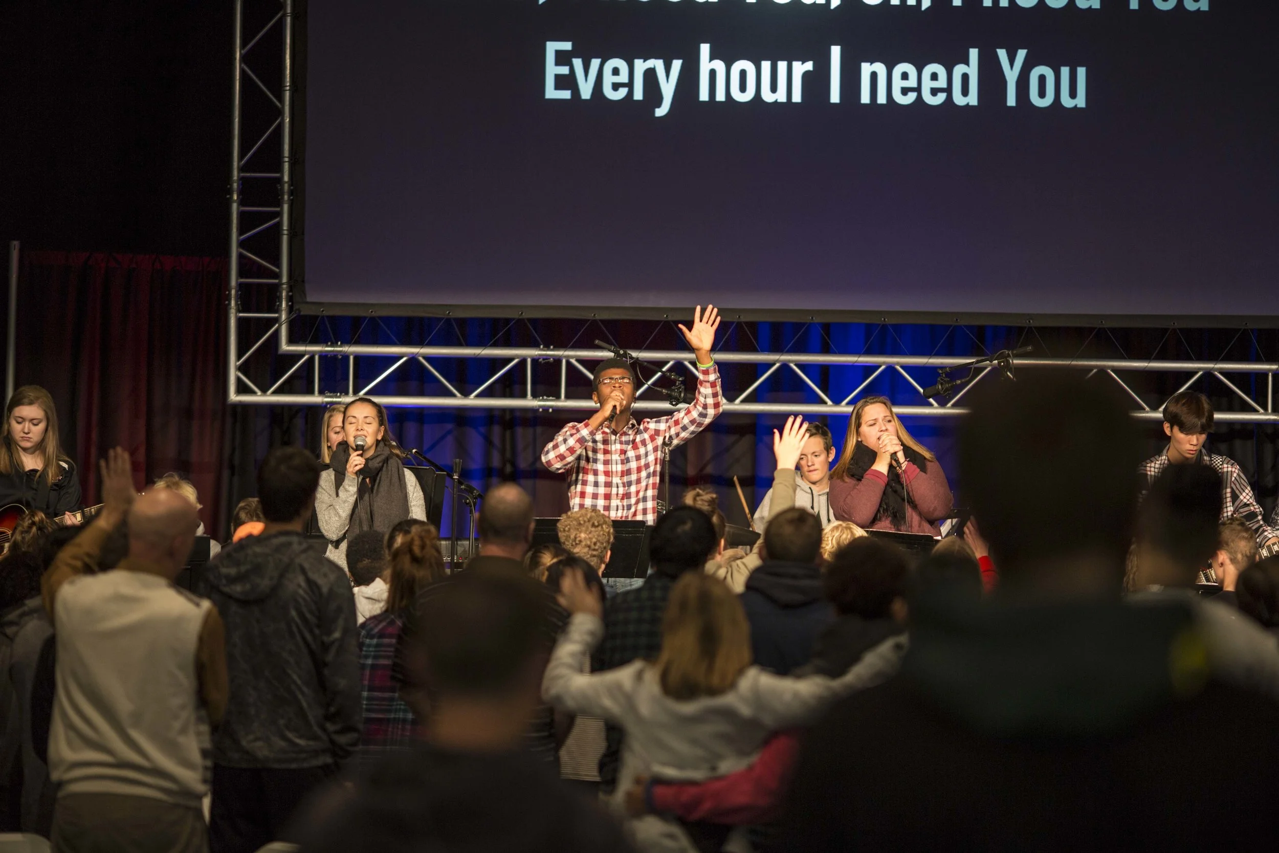 Sam Ihrke leads the Praise Team during the Prayer Day worship set