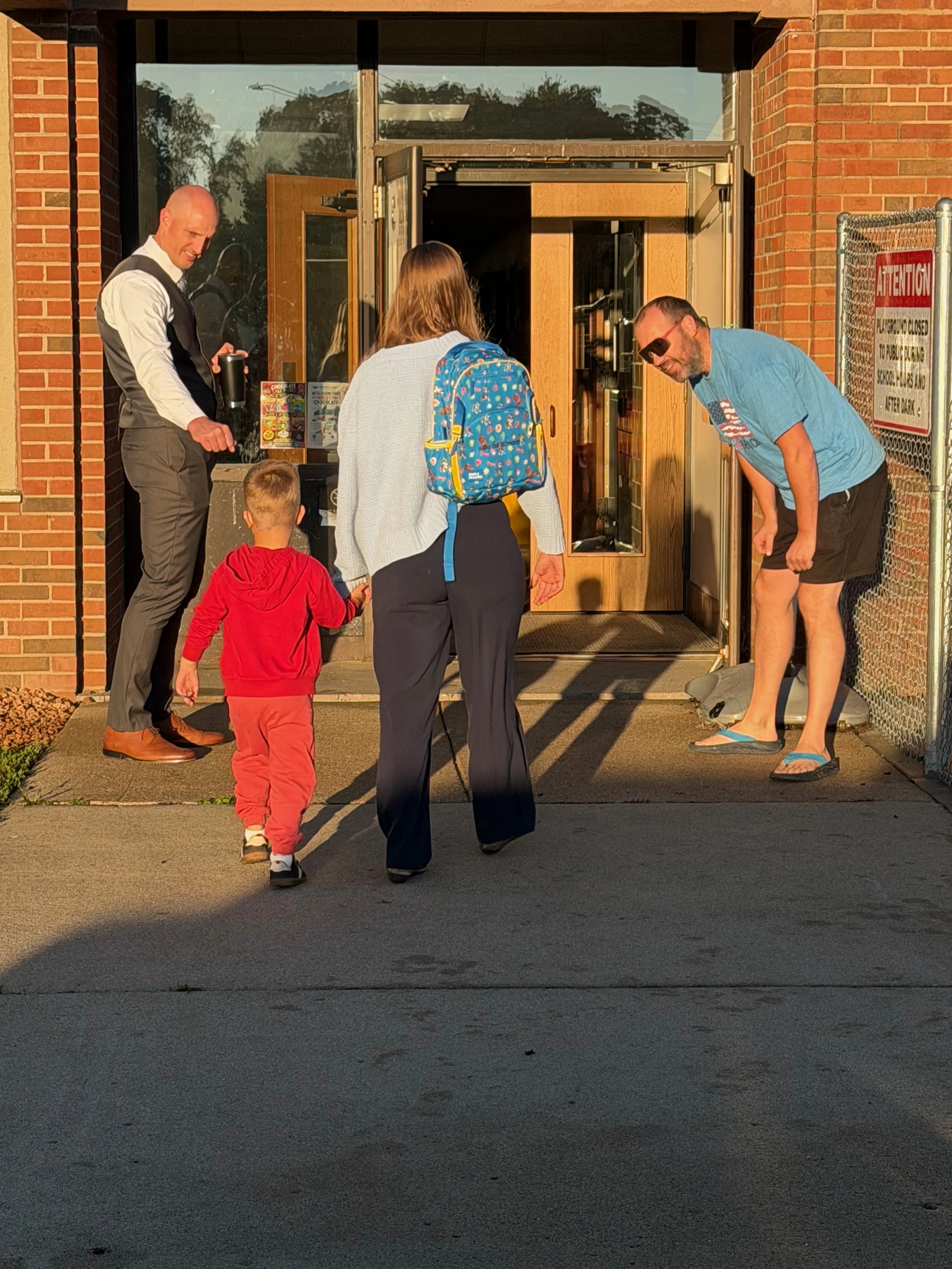 Cheering Them In: How Dads at the Doors Helps Students Grow, Learn, and Belong