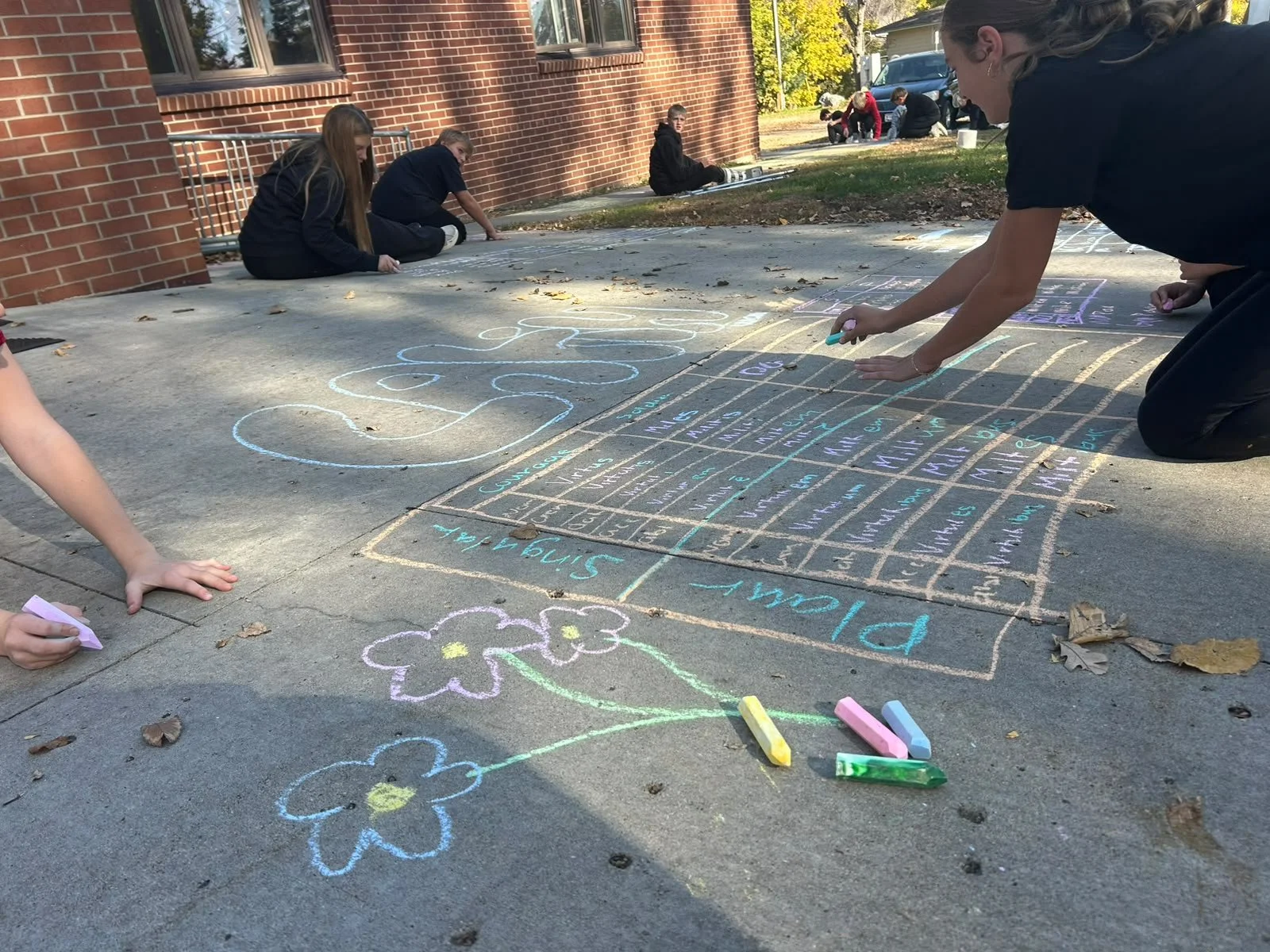 Latin Comes to Life For Hillcrest Students Who Turned Sidewalks into Classrooms