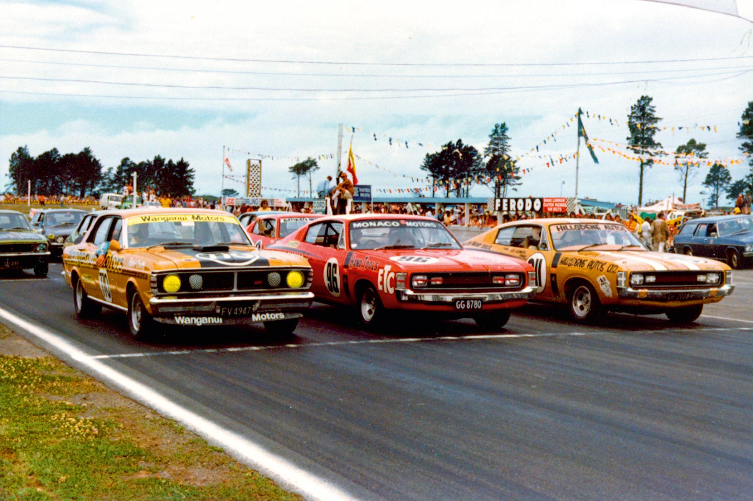 Production racing muscle cars. Patrick Smith in the Falcon GT-HO Phase&nbsp;III lines up next to the E49 Chargers of Rodger Anderson and Leo Leonard