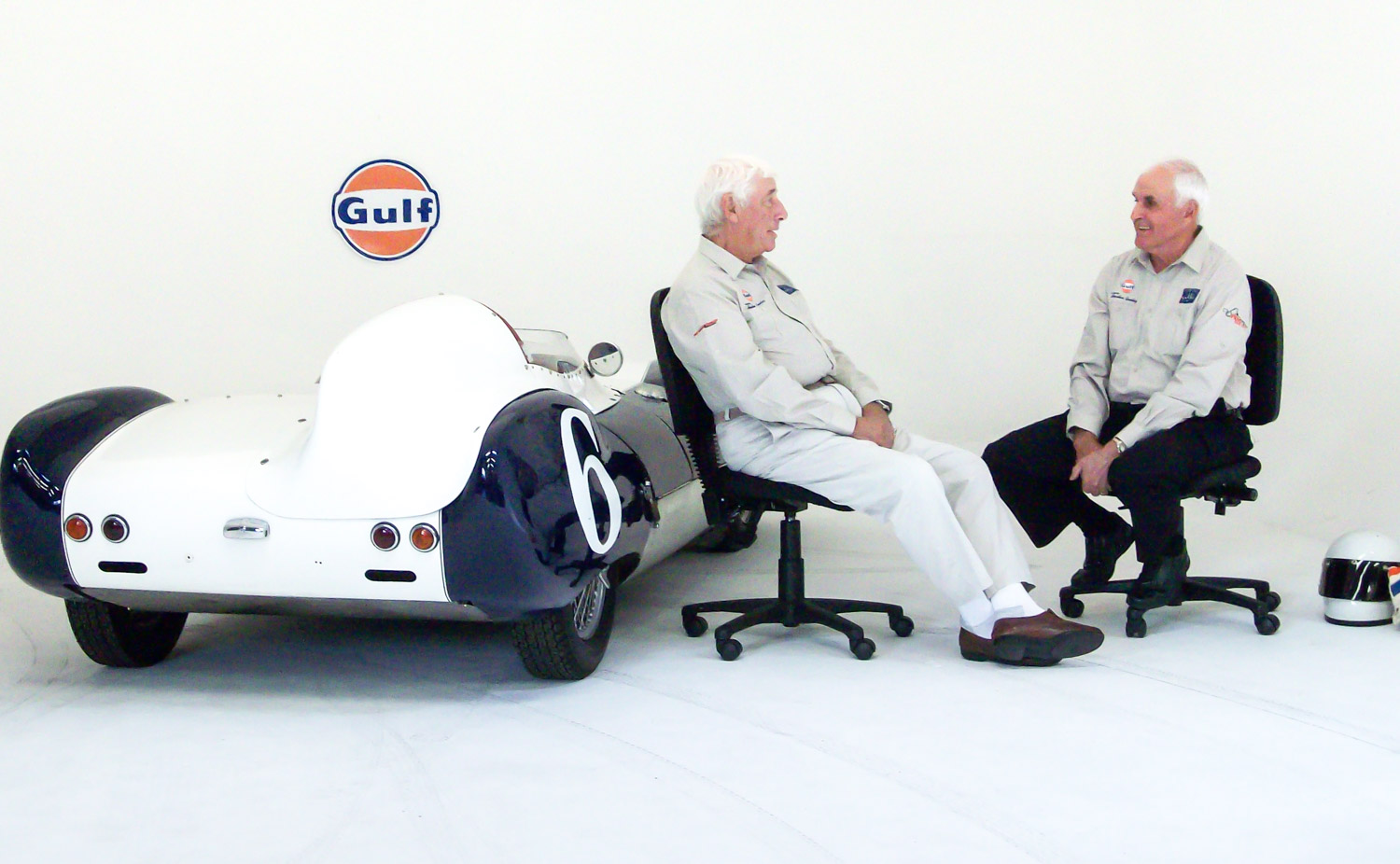 Howden discusses fast cars and motorsport with Jim Barclay (right), the director of the NZ Festival of Motor Racing