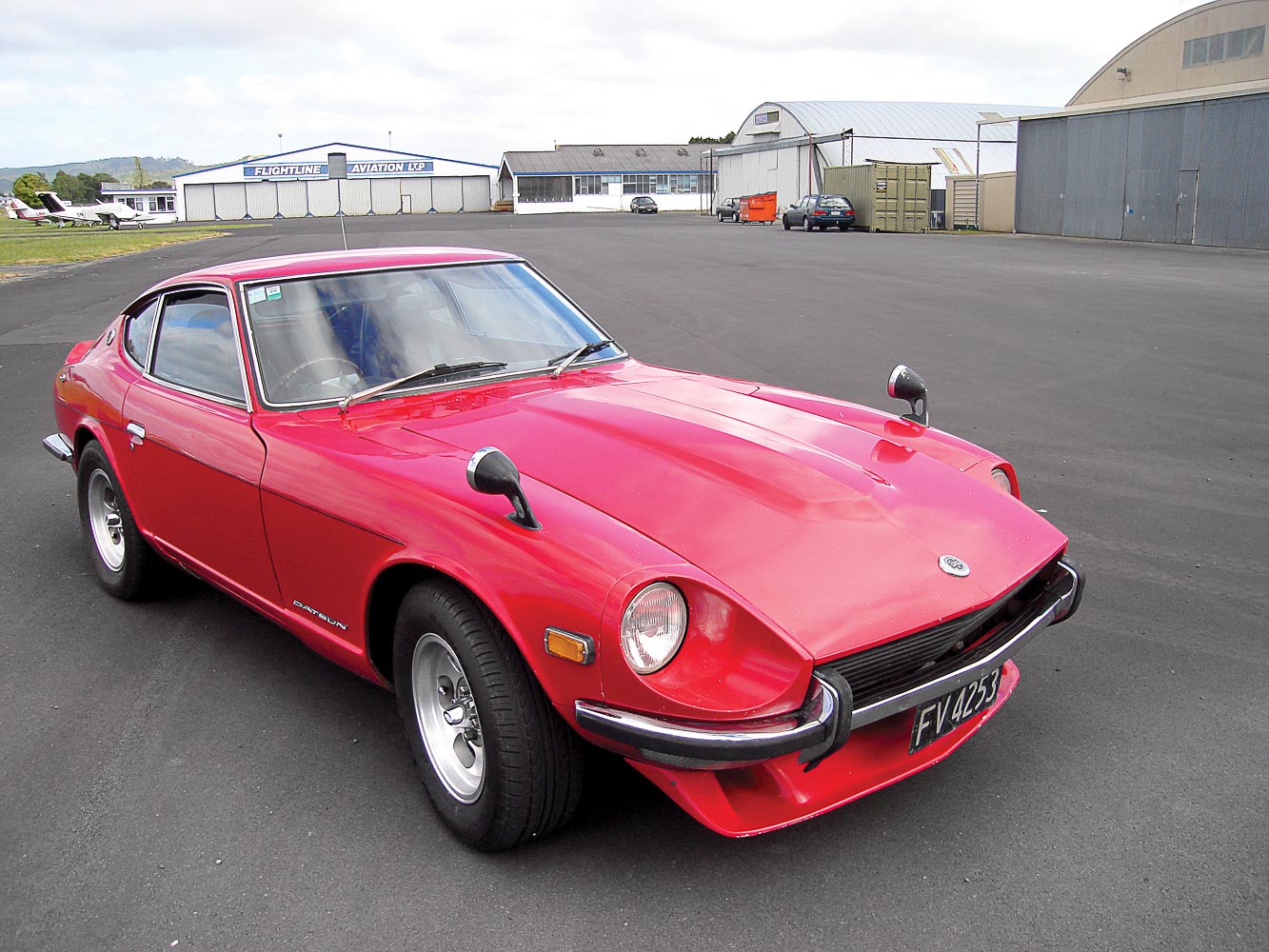 The Motorman 240Z — now painted red — in exactly the same spot at Ardmore airport in 2015