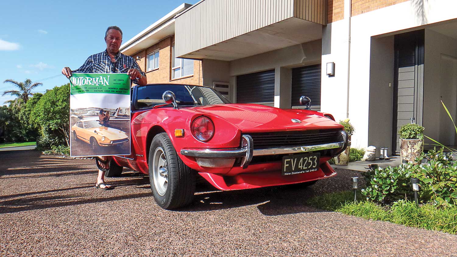 Ken Brough with his much-loved 240Z and a poster-sized blow-up of the Motorman cover from 44 years ago