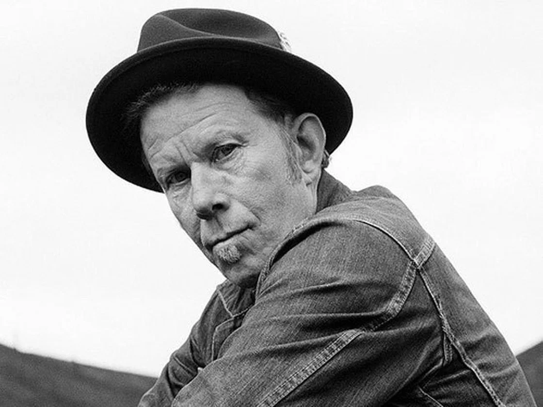 Is Tom Waits a creative genius? No, Tom Waits HAS a creative genius who sometimes (well... often) comes down a sweeps a wave of creation his way.