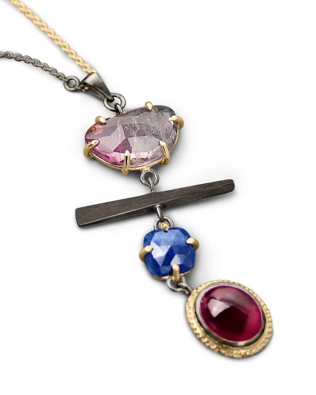 I am always interest in know the meaning behind the stones I am wearing. Jewelry with stones carry meaning allowing me to wear a personal, symbolic piece. 

A graduated colored tourmaline, features a spectrum of colors within one stone, symbolizes ha
