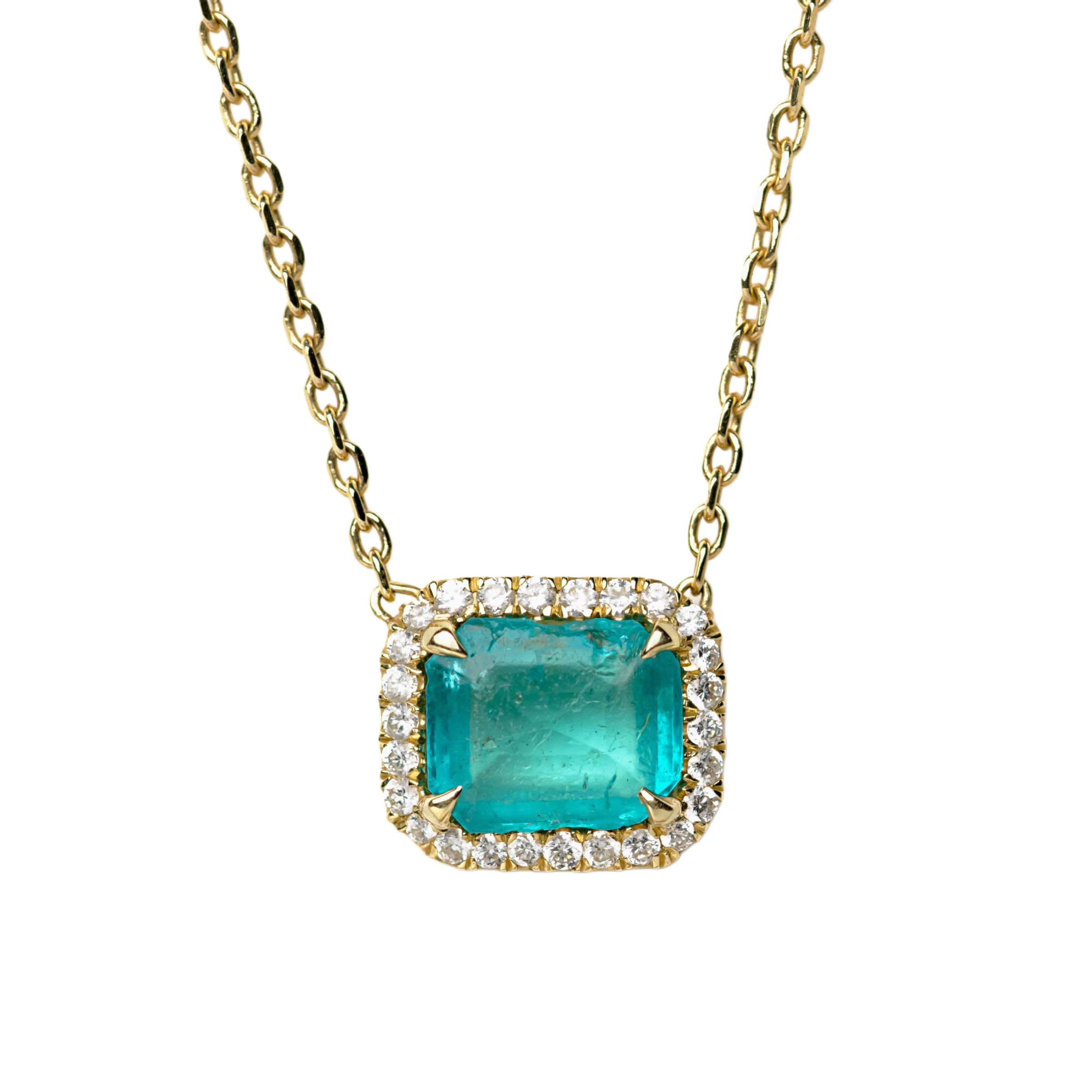 Heirloom Redesign An emerald-cut emerald pendant necklace on a 18k gold chain, featuring a delicate diamond halo diamonds set in 18k gold.