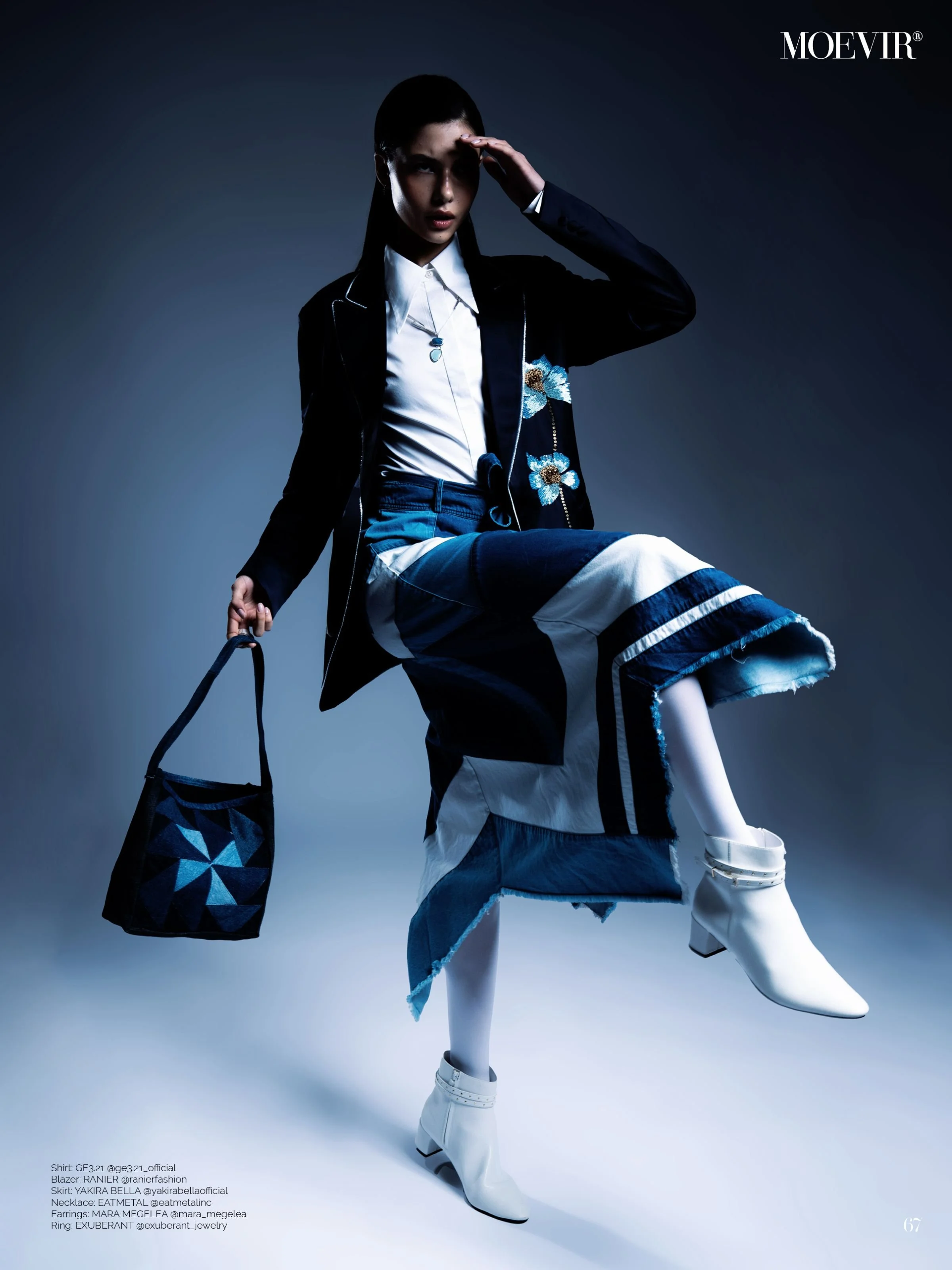 Moevir magazine model wears EatMetal Chevron Necklace made with London Blue Topaz and Milky Aquamarine and diamonds