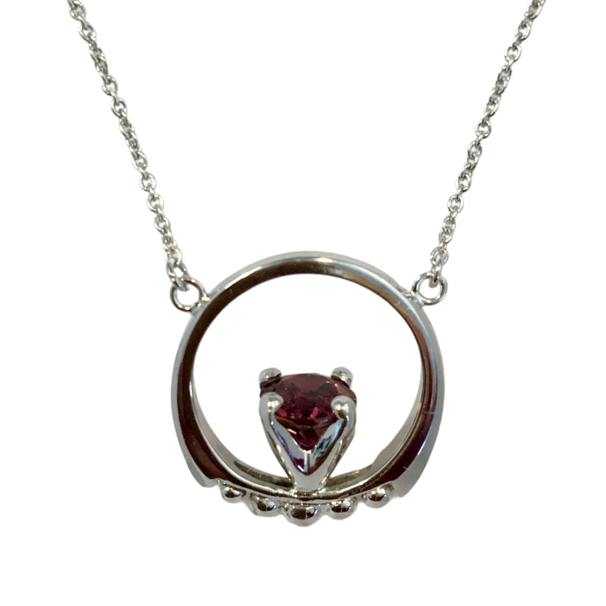 Heirloom Redesign A 14k white gold circle pendant necklace featuring a central prong-set, round pink tourmaline gemstone on a delicate 14k white gold cable chain.