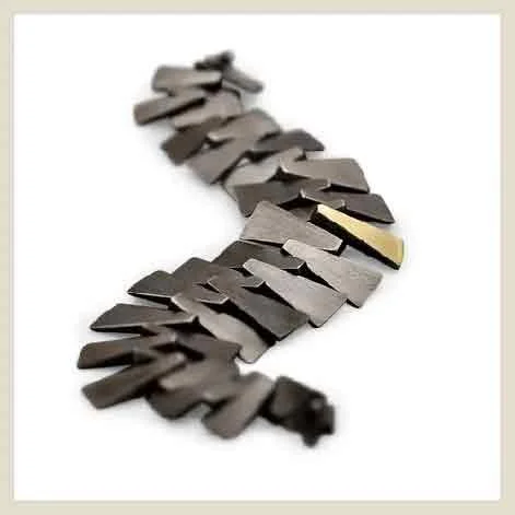 Chunky bracelet made with many different links.