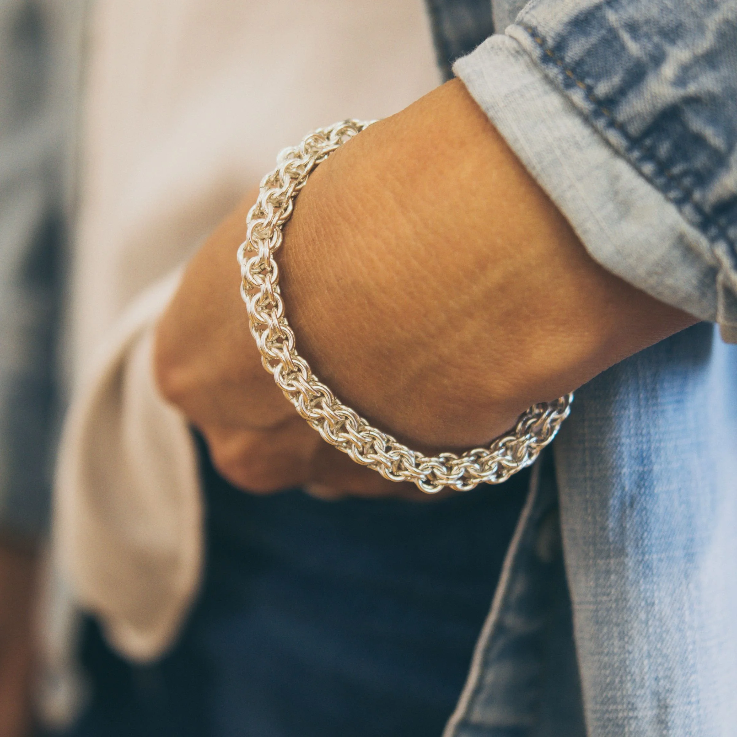 gold or silver open round maille is available as a bracelet and necklace