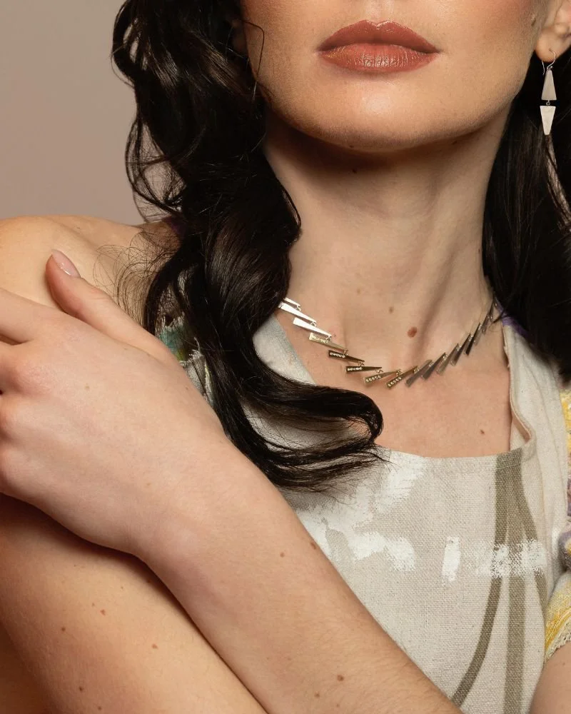 GEZNO magazine model wears collar necklace 18k gold champagne diamonds and silver 925