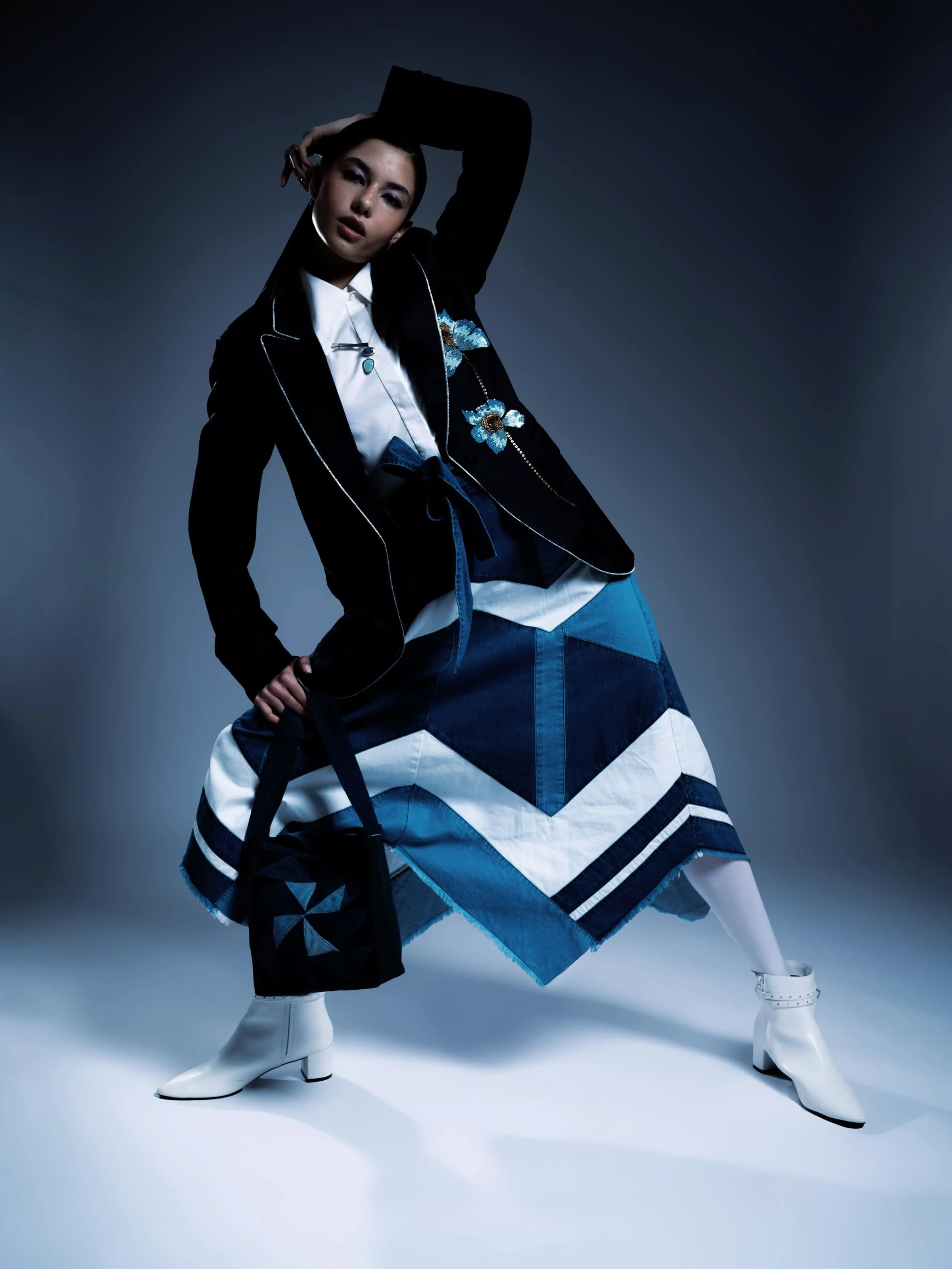 Moevir magazine model wears EatMetal Chevron Necklace made with London Blue Topaz and Milky Aquamarine and diamonds