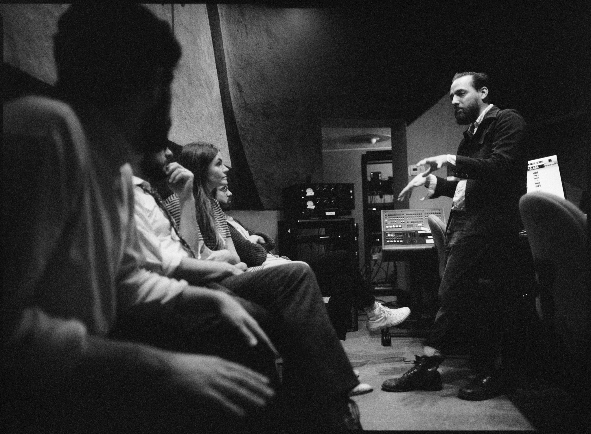 Matt Ross-Spang talking through the song with Erin Rae and the band in the control room