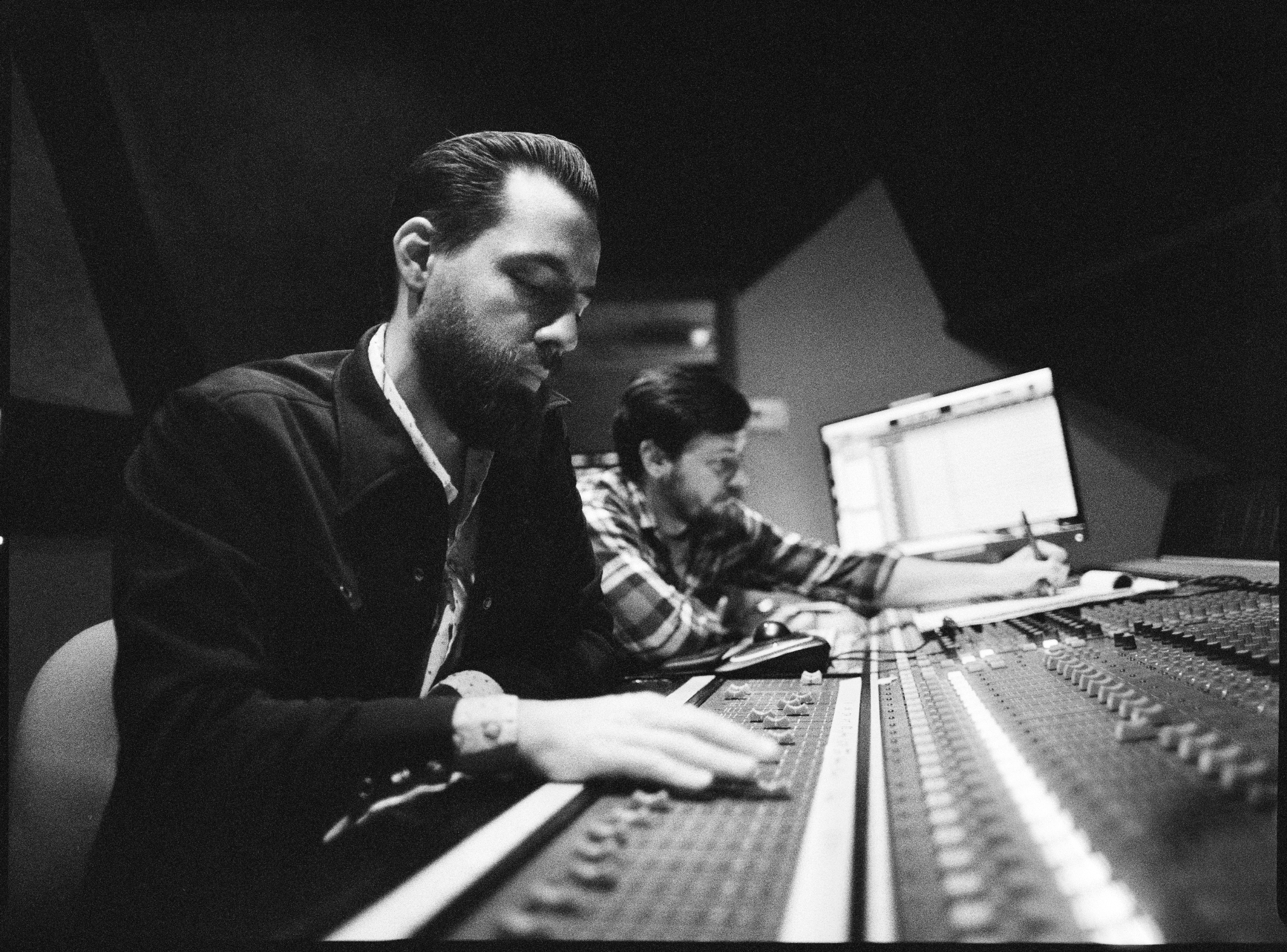 Producer Matt Ross-Spang adjusting levels in the control room of Sam Phillips Recording in Memphis, TN
