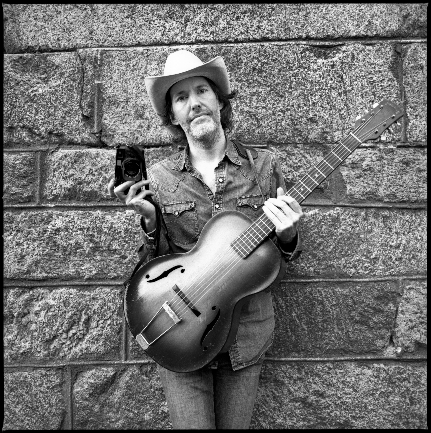 Dave Rawlings and his Leica camera at Newport Folk Fest