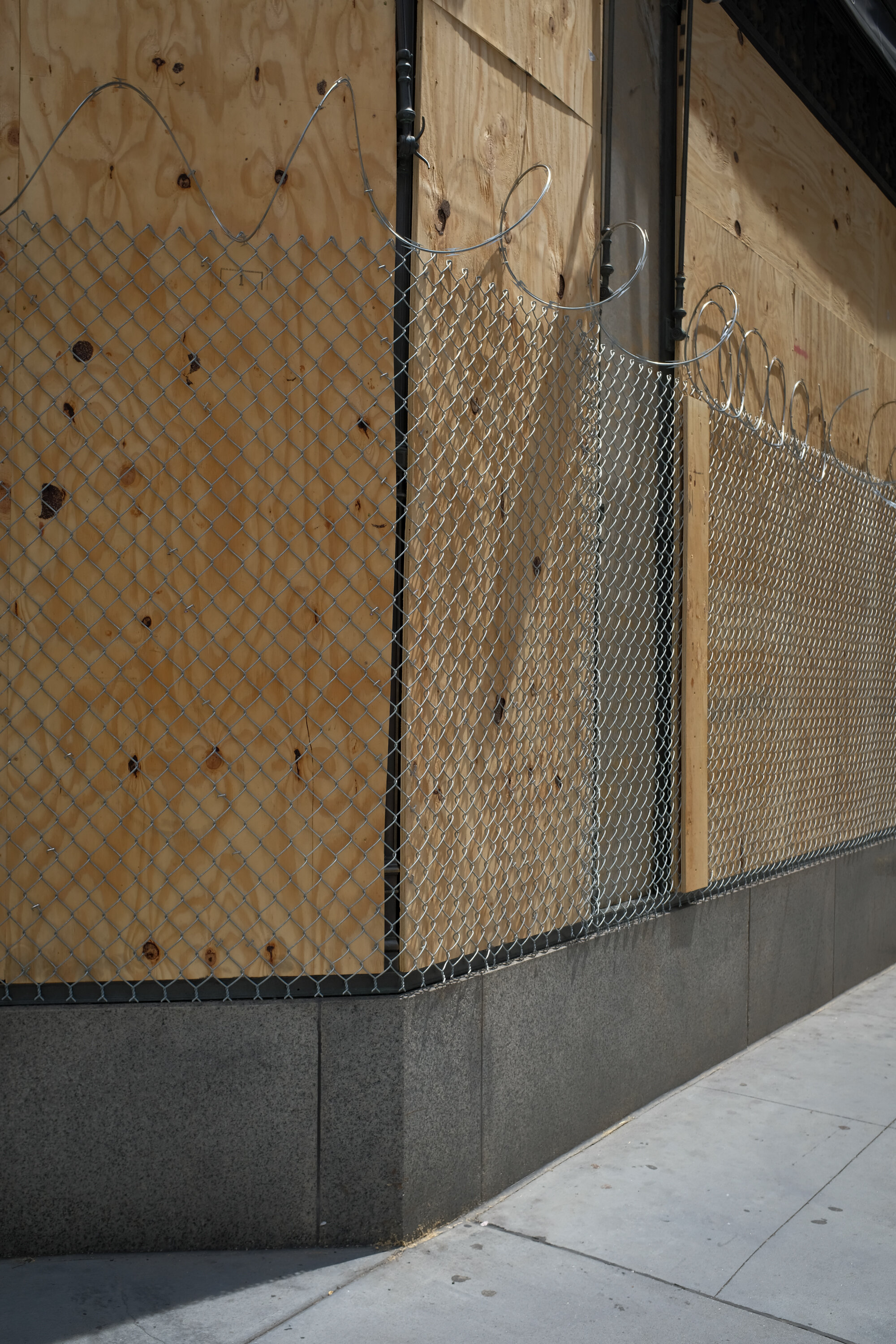  Barbed wire surrounds a boarded up Saks Fifth Avenue in New York before planned protests in the wake of the death of George Floyd, a Black man killed by police in Minneapolis, on June 4, 2020. 