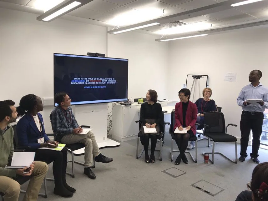 Angela (second from left) shares her experiences as a young, female researcher from rural Uganda addressing gaps in health systems.