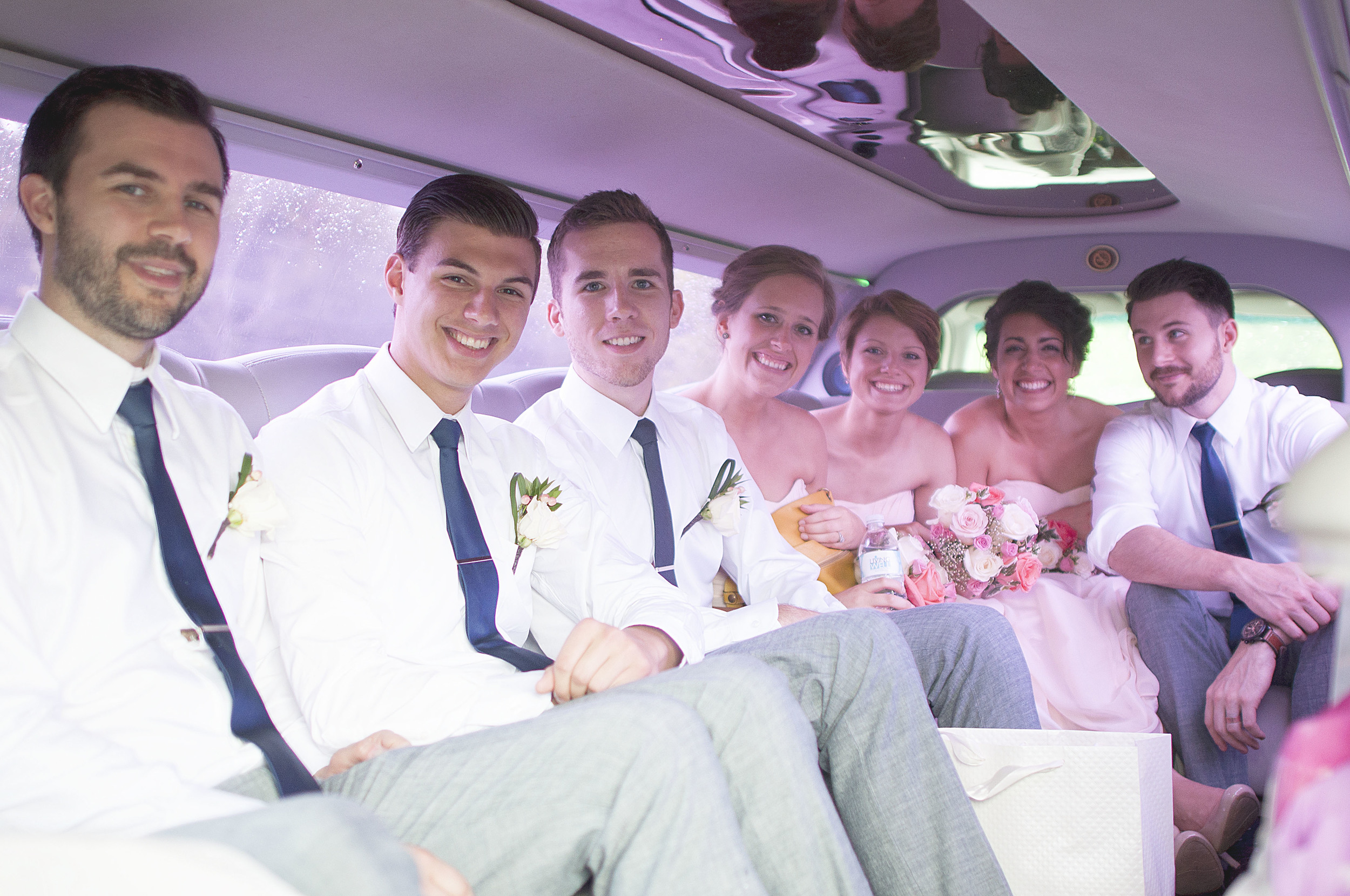 Holly was surprised with a limo ride to the reception! Unfortunately this was the point where an unexpected rainstorm begun.