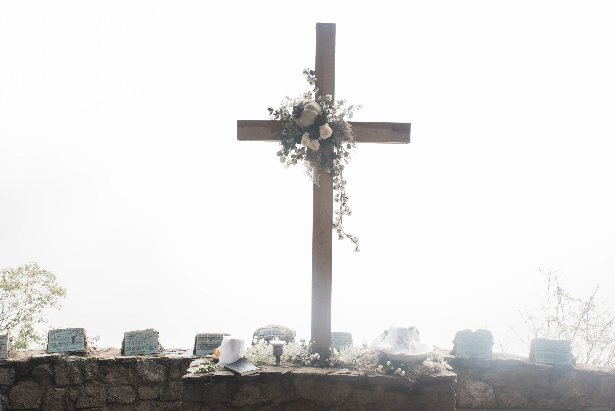 This is the overlook where you *should* be looking into the beautiful mountains, but due to the fog, could ONLY see this white wall. It ended up being the coolest thing. Special shoutout to Margaret's aunt for putting together this gorgeous arrangement on the cross!