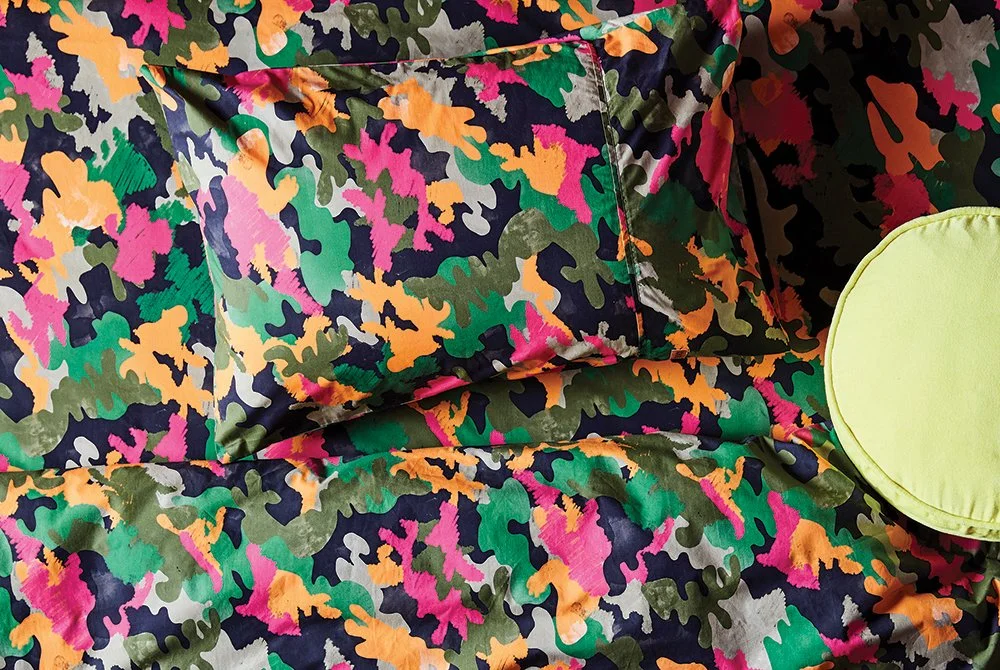 Kip&Co repeat print textile design for bedding, homewares and apparel. Camouflage repeat print in pink, orange, olive green, green, grey and black. 