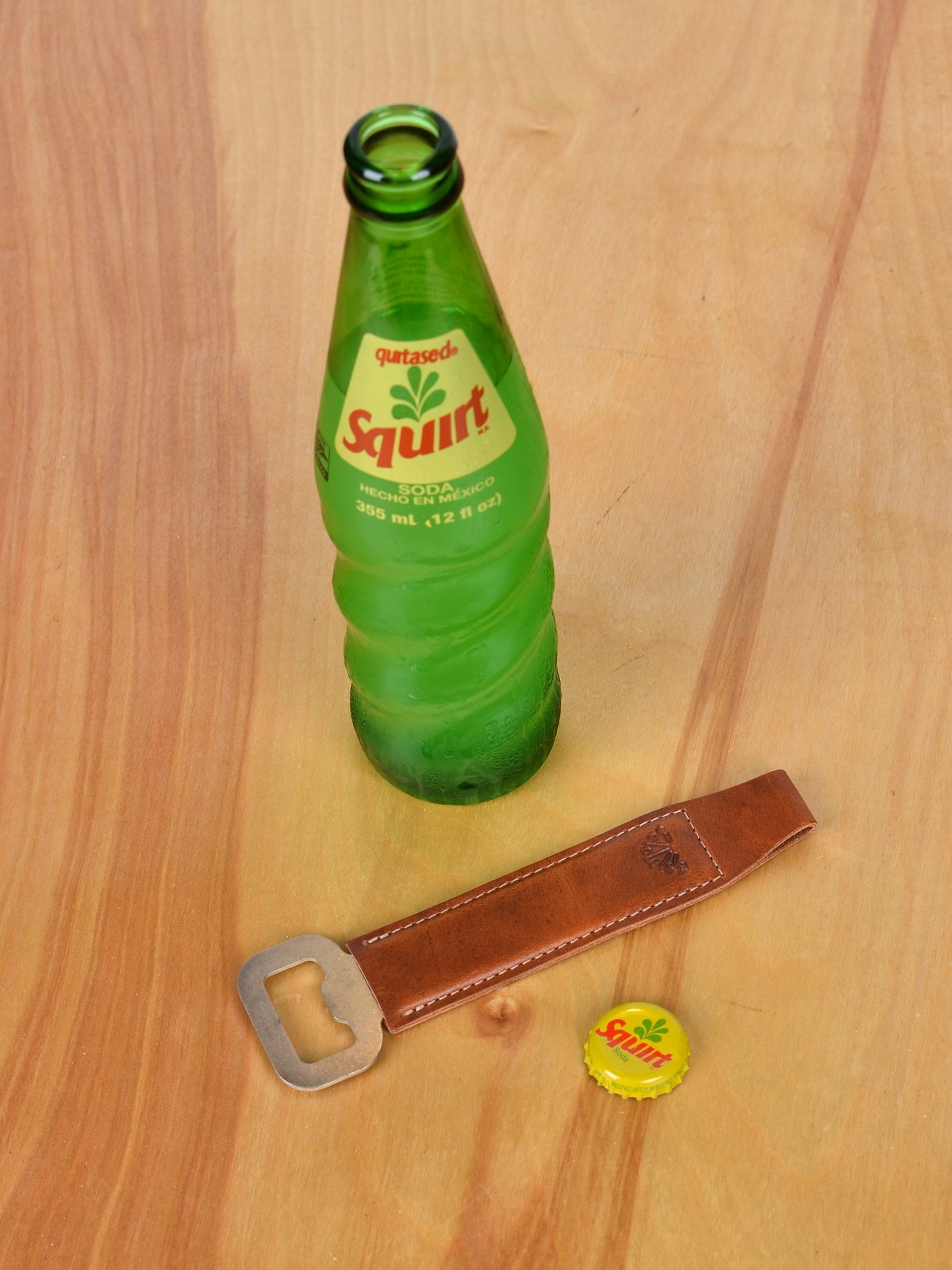 Bar Blade in Brown

A leather and steel bottle opener designed to patina with use.

Deadstock: Designed in 2016, out of production since 2019.

Inspired by the flat metal bottle openers found in the back pockets of bartenders all over the world&mdash