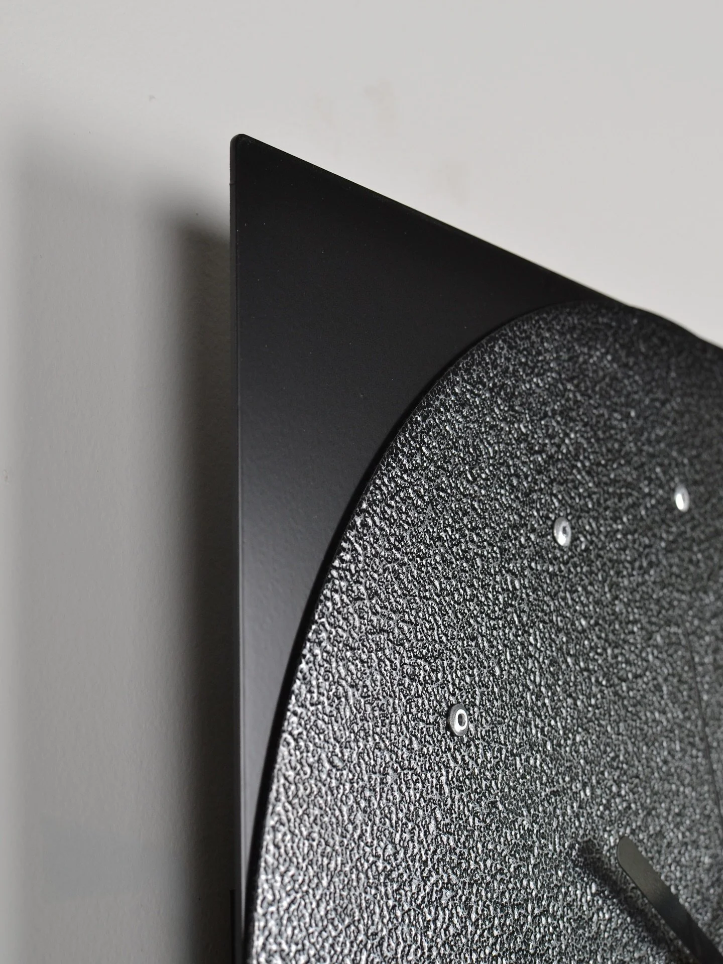 Like the previous releases in the series, Timepiece N&deg;5 features exposed rivets as both a functional and aesthetic detail&mdash;the clock is assembled from multiple riveted aluminum parts and the fasteners also act as hour markers.

Limited first