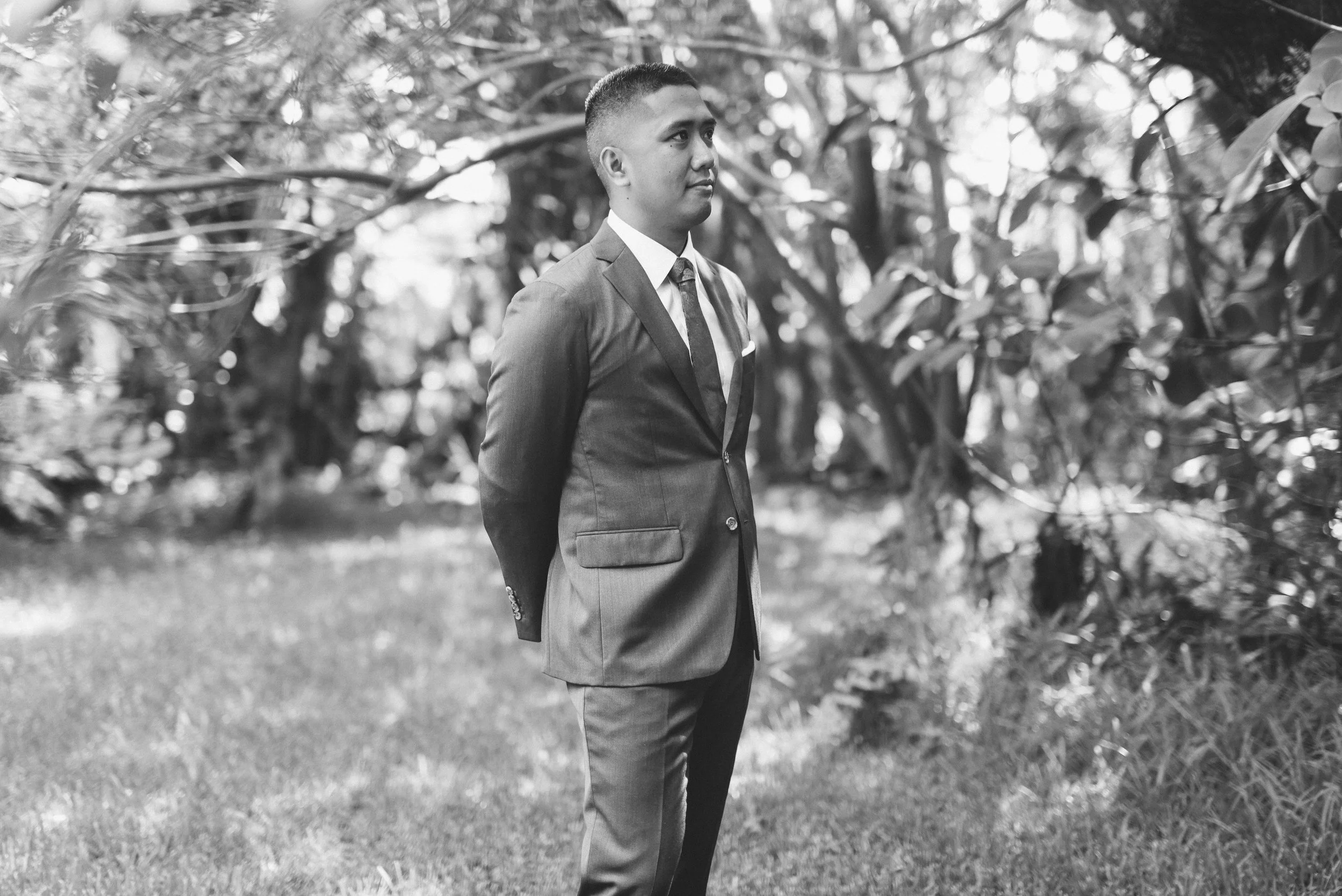 hawaii-colorful-tropical-boho-waimea-valley-wedding-firstlook (1).jpg