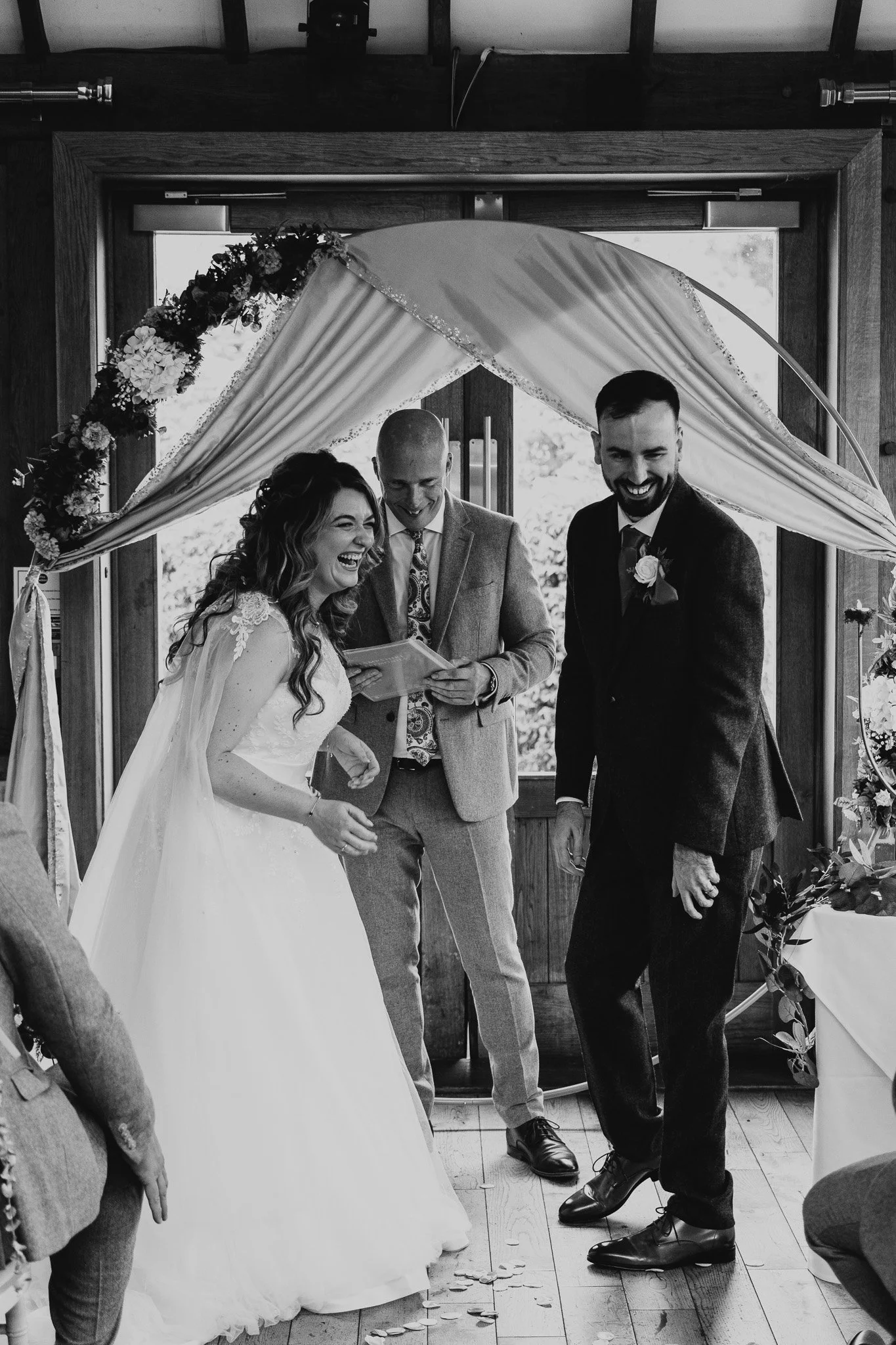 A happy couple on their wedding day, just after they say ‘I Do’ at the front of the service, held at Old Thorns Hotel and Resort, Hampshire.