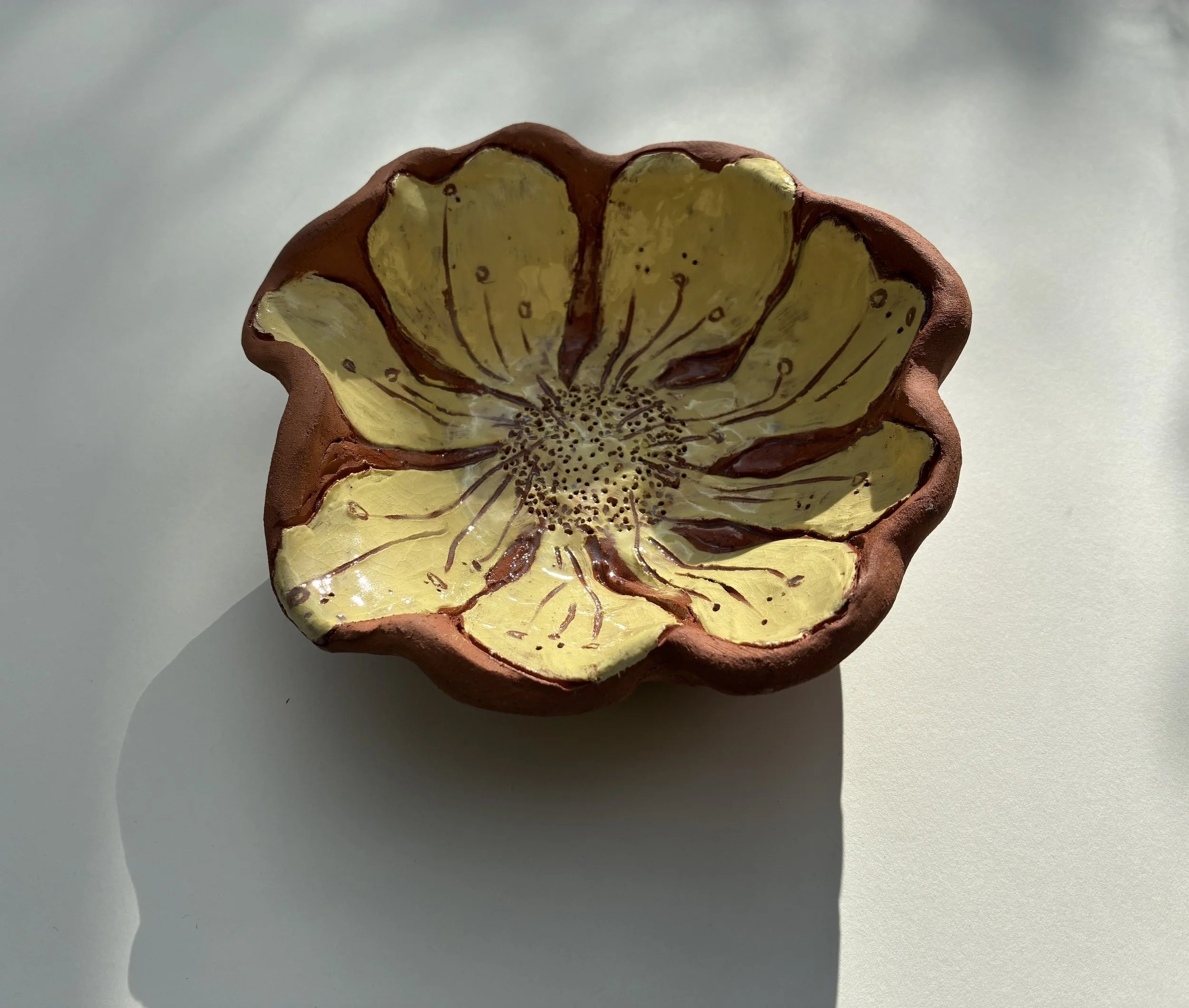    Flower Dish.   Terracotta and yellow slip with sgraffitto decoration. 26 