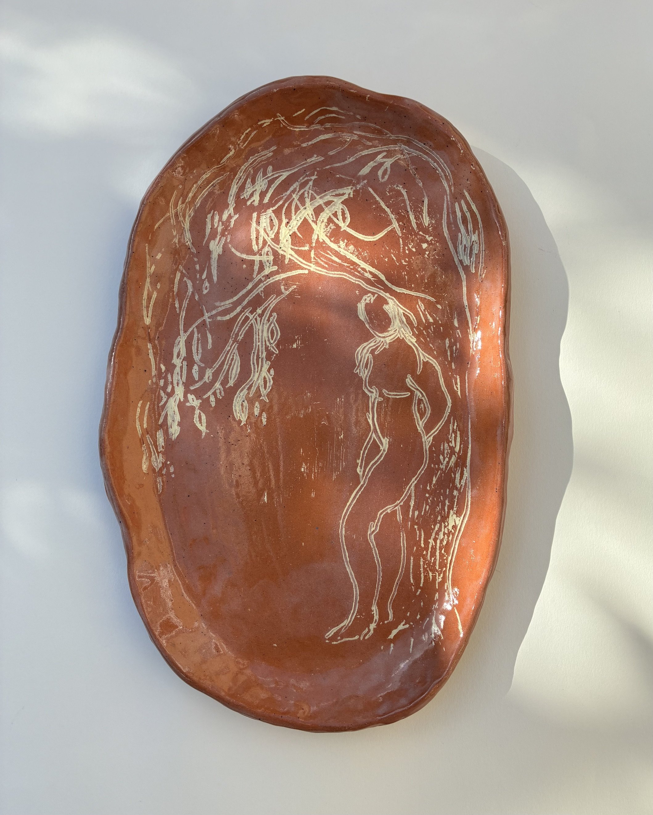    Woman and willow.    Handshaped terracotta dish with Sgraffitto decoration. 2026 