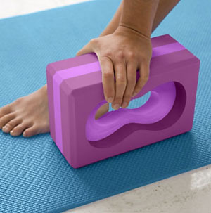 This is a block that allows gripping instead of placing the hand flat down on the floor or block.
