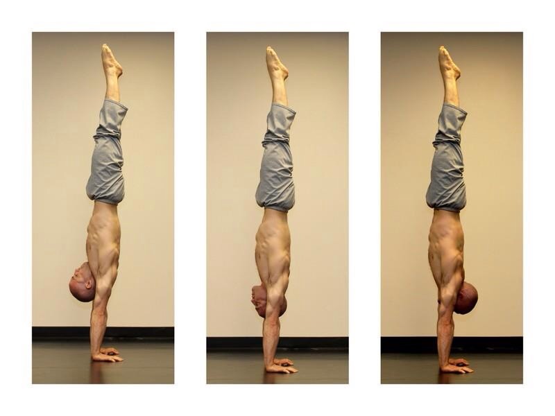  Here's an example of a truly stunning, non rib thrusting handstand with different head positions.&nbsp; He has amazing overhead range and is able to keep the body stable and the shoulders protracted. 
