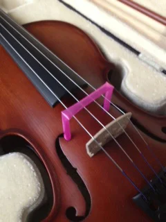 Using a straw to create a bow barrier closes the chain, giving the student proprioceptive information about where the bow is (contact point) and whether or not is straight.