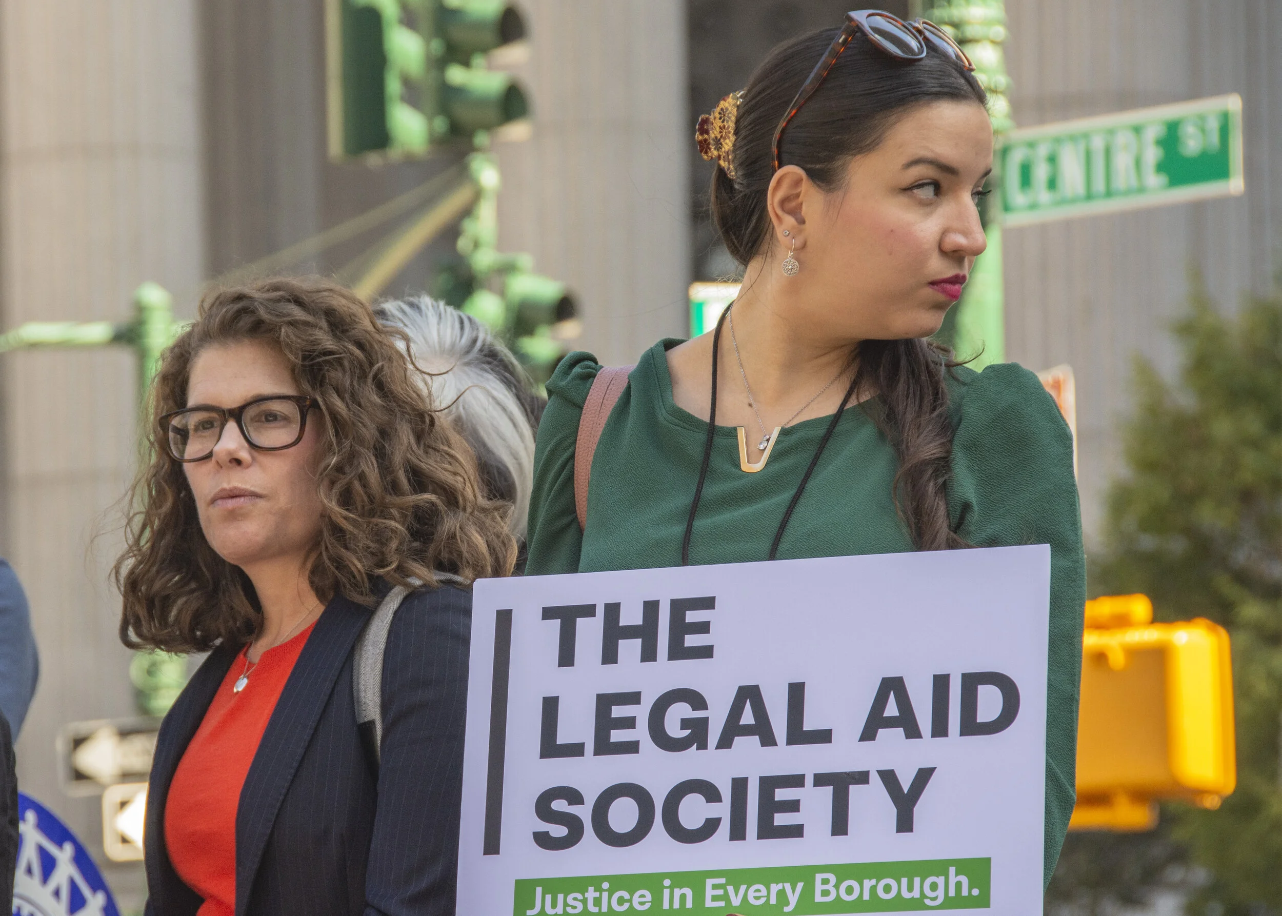 ice out 9.25-holding signs_1.jpg