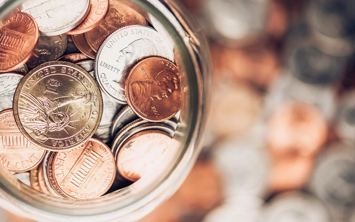 charitable-giving-coins-in-jar.jpg