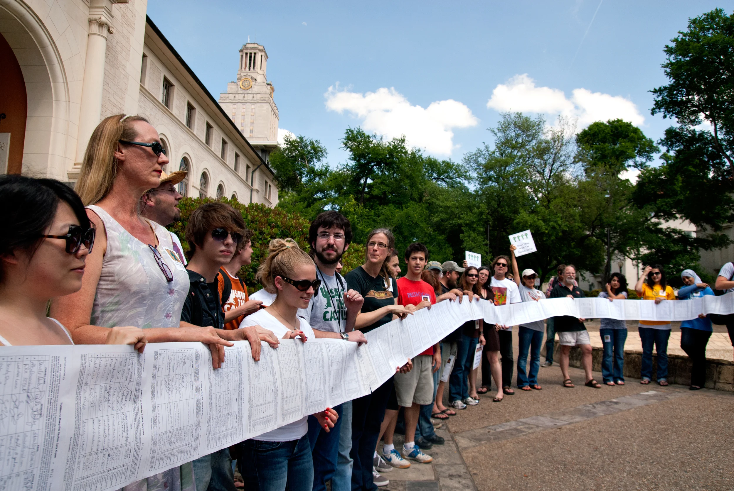 Cactus advocates display petition signatures in a scroll that stretched as long as a football field, April 21, 2010. (6)