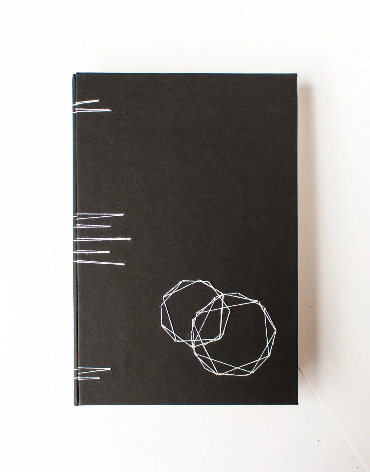 Black Book with Circle Design - Cream Paper