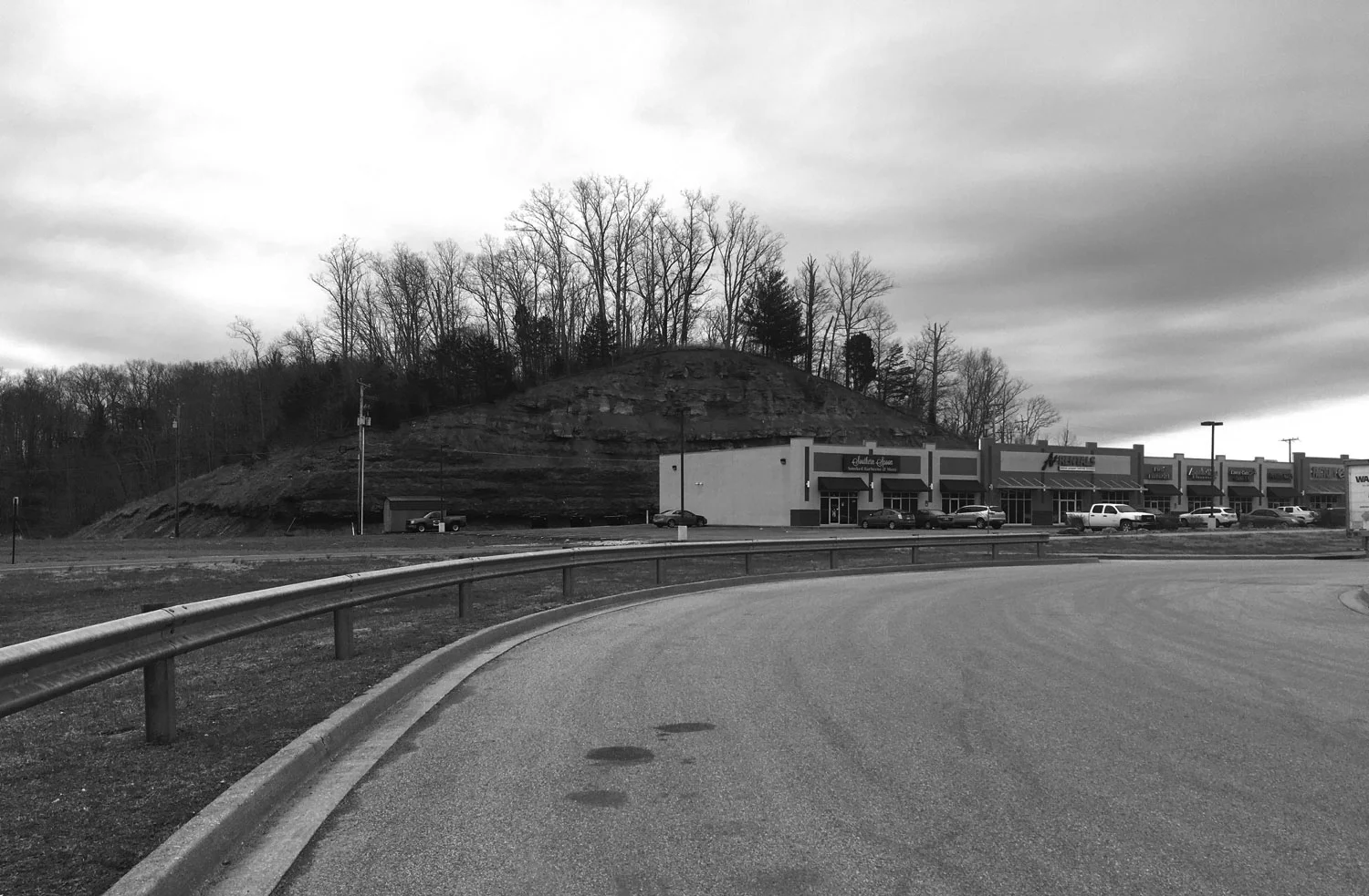 Former mining site redeveloped as a strip mall in Louisa, KY. (Research photograph, J. Becker)