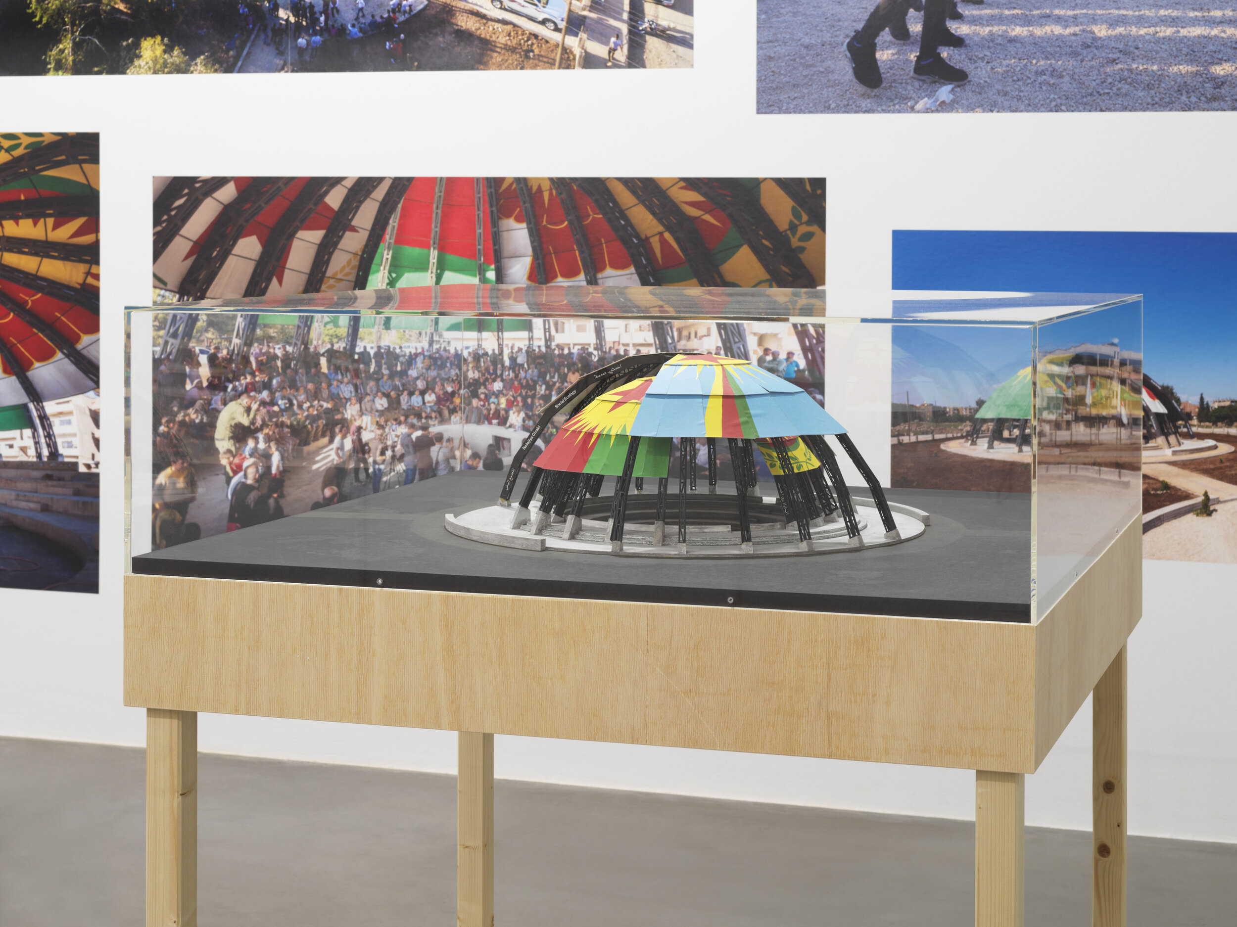  Democratic Self-Administration of Rojava and Studio Jonas Staal,&nbsp; New World Summit Rojava ,&nbsp;2015 – 2018, installation view  Demokratie heute – Probleme der Repräsentation,  2021, Maschinenhaus M1, KINDL, photo: Jens Ziehe 