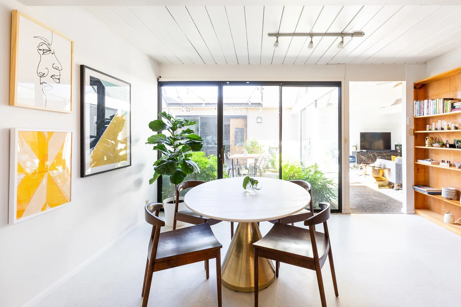 "A space in my house that I love is our bougie breakfast nook with the fancy marble table and brass pedestal bottom," says Encarnacion. (Gillian Walsworth)