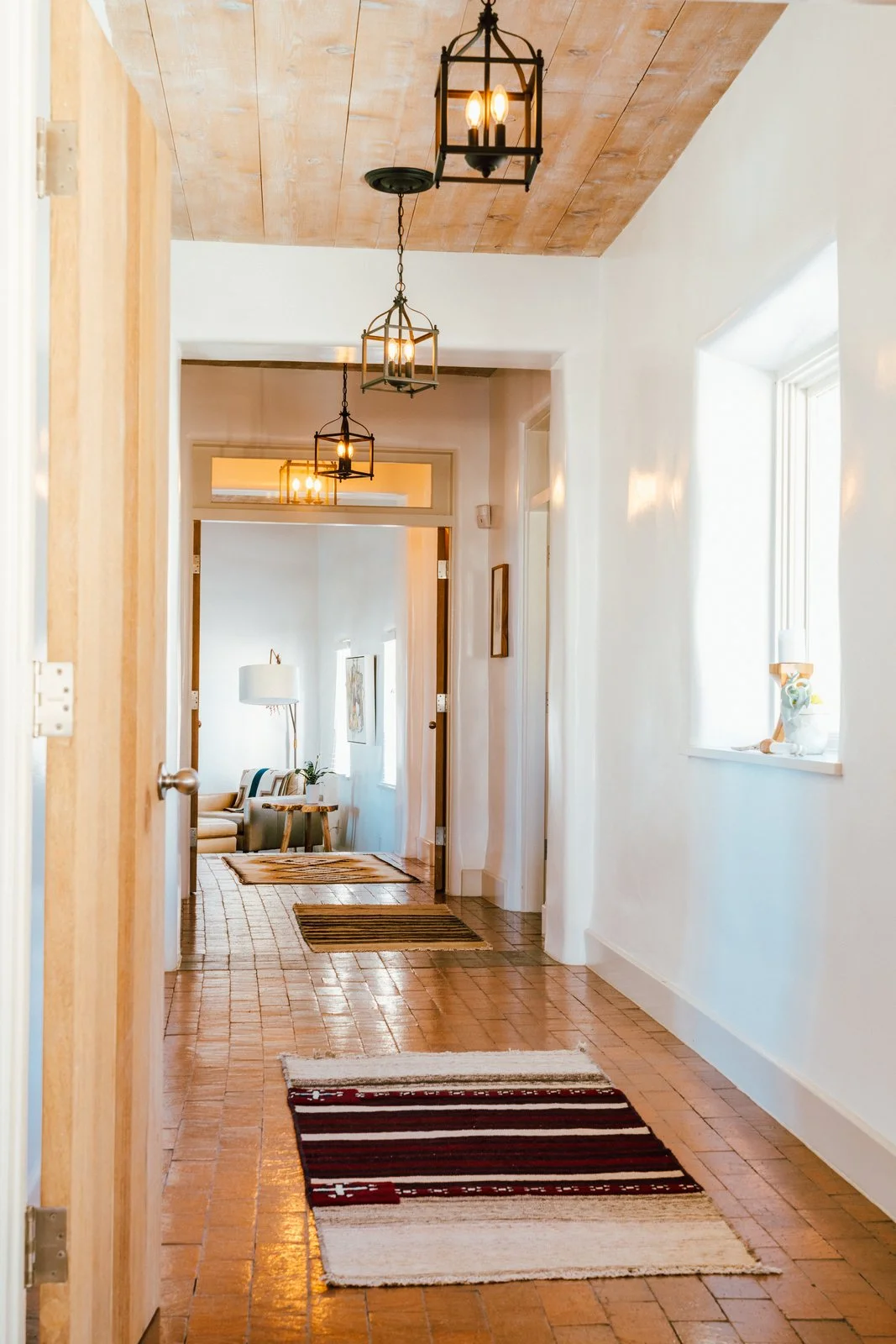 Young's obsession with textiles is apparent—vintage rugs are strewn throughout the home in an array of styles and hues. (Tim Melideo)