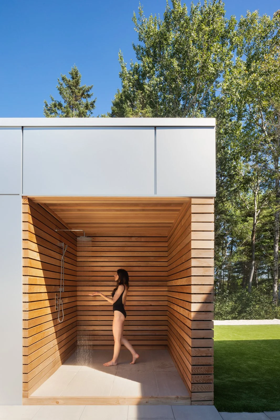 An outdoor shower offers a zen-like sanctuary to wash off the day. (Ema Peter Photography)