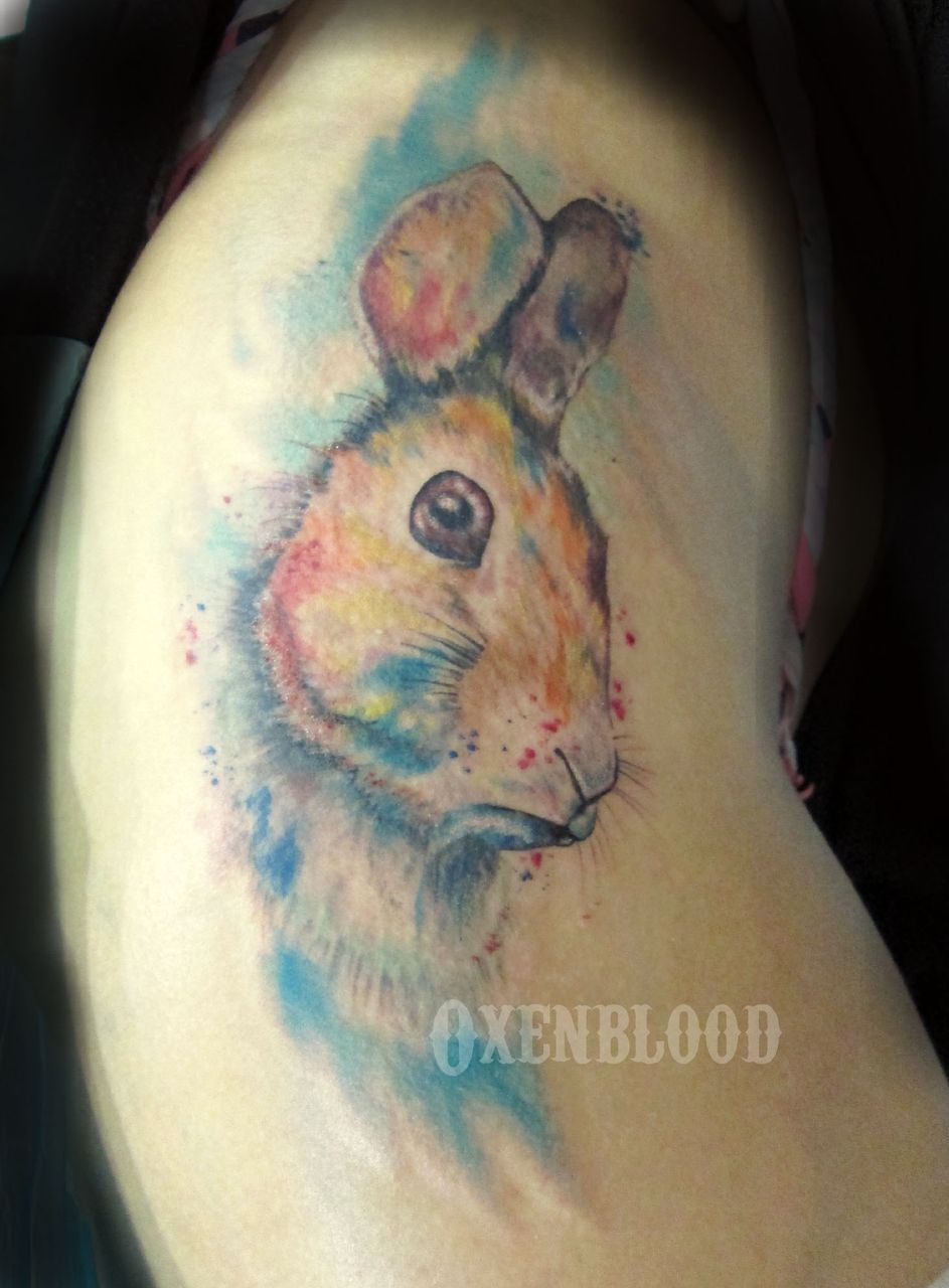 Watercolor style rabbit on hip