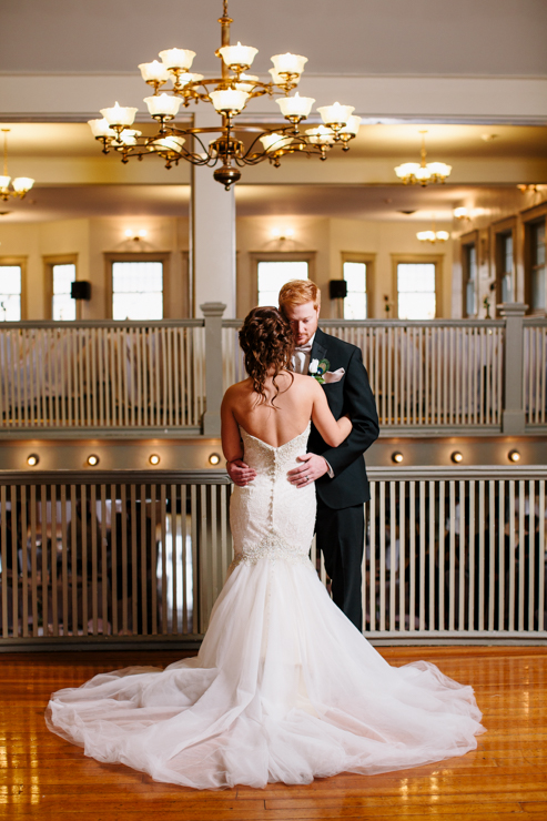 Photo of the bride and groom inside ballroom