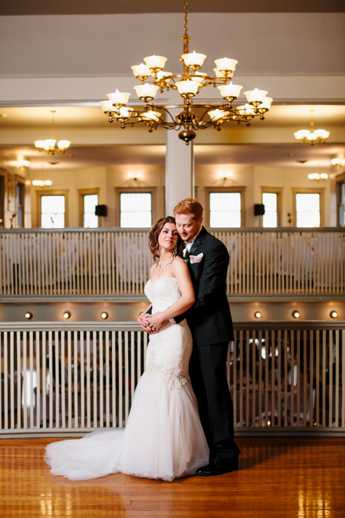 Photo of the bride and groom inside ballroom