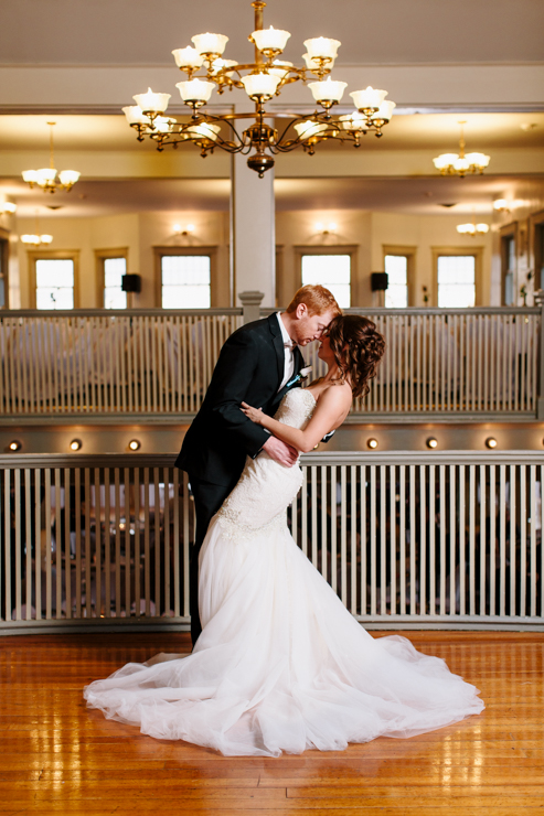 Photo of the bride and groom inside ballroom
