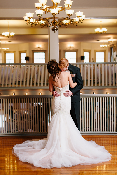 Photo of the bride and groom inside ballroom