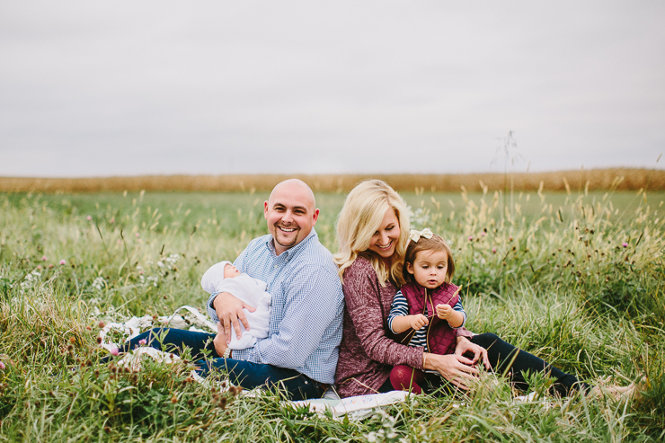 Family of four photography in a field in the midwest