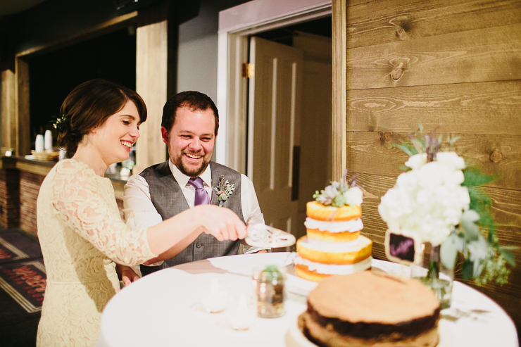 Bride and Groom cutting their wedding cake