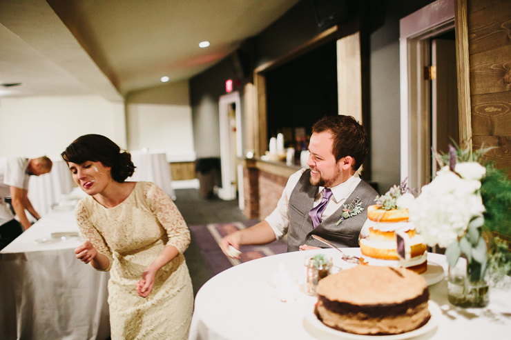 Bride and Groom cutting their wedding cake